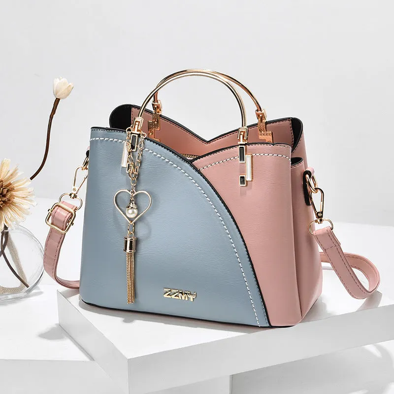 Clara  Handtasche mit Farbblock und Quaste fr Damen