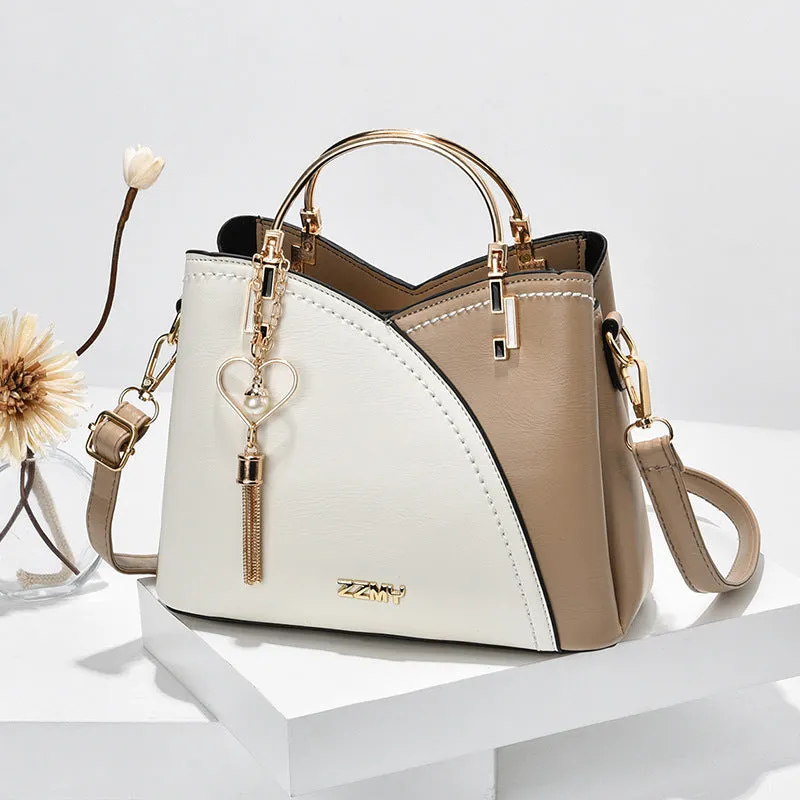 Clara  Handtasche mit Farbblock und Quaste fr Damen
