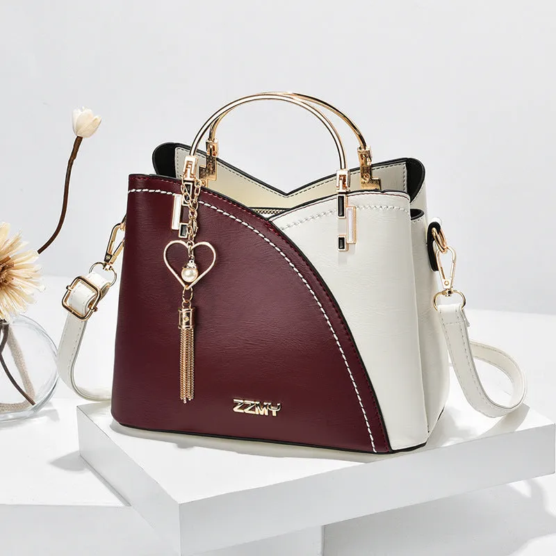 Clara  Handtasche mit Farbblock und Quaste fr Damen
