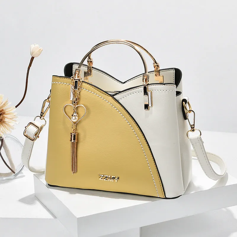 Clara  Handtasche mit Farbblock und Quaste fr Damen