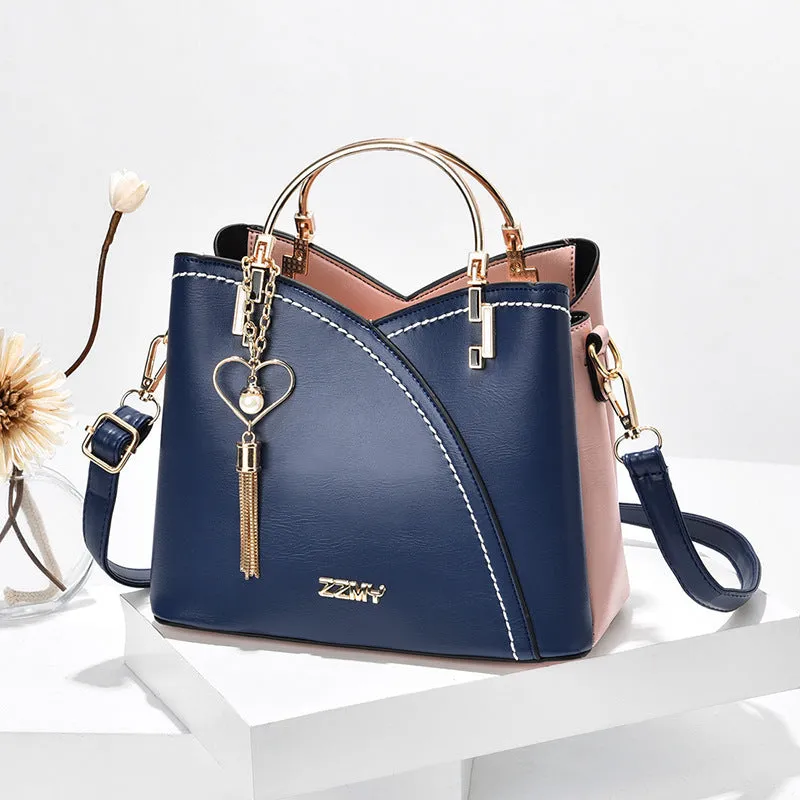 Clara  Handtasche mit Farbblock und Quaste fr Damen